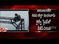 Man climbs Railway High Tension Pole in Kadapa -Visuals