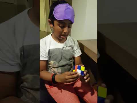  10 year old solving Rubik's cube blindfolded in 22 seconds