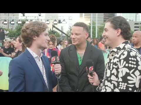 Dawson Mercer and Arthur Kade interview Kane Brown on the black carpet at the 2022 MTV VMAs. video clip
