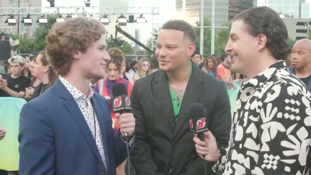 Dawson Mercer and Arthur Kade interview Kane Brown on the black carpet at the 2022 MTV VMAs. video clip 