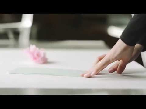 DIY Tissue Paper Poms - mywedding.com