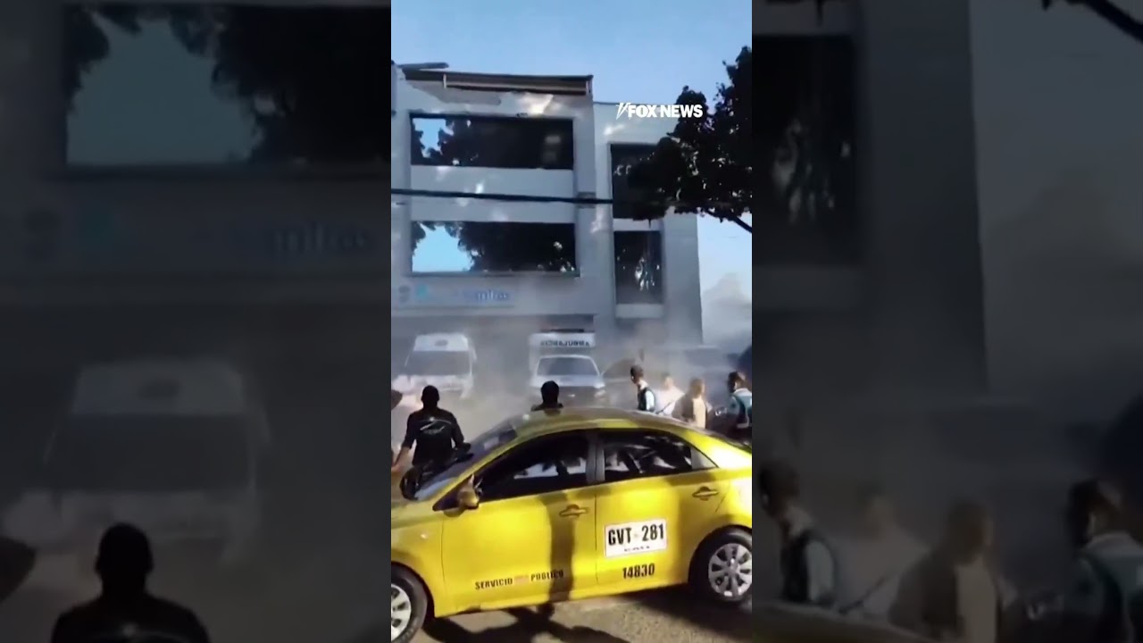 People FLEE as earthquake in Colombia sends debris CRASHING into ambulance #shorts #earthquake #news