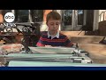 9-year-old typist master is making Mothers Day cards with vintage typewriter