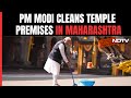 PM Modi Cleans Temple Premises In Nashik