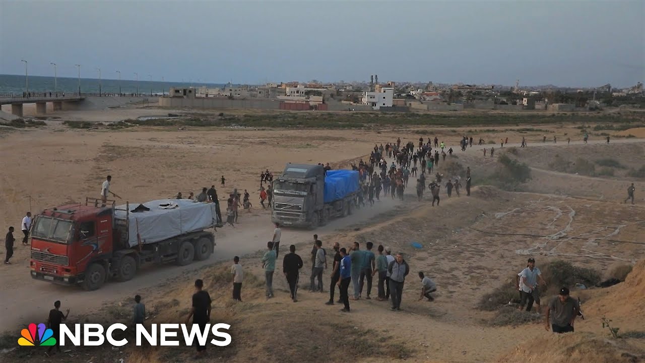 Trucks carry aid from new U.S.-built pier in Gaza