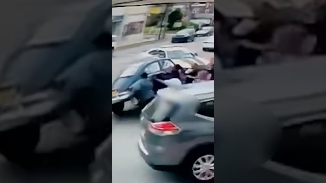 Strangers lift car off woman trapped after e-bike crash