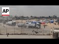 Aid trucks move into Gaza through Rafah crossing