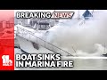 Multiple boats catch fire at Canton marina, 1 sinks