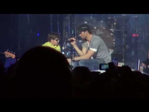 Kid dancing at enrique iglesias concert