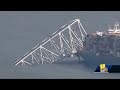 SkyTeam 11 raw video: Explosives break apart Key Bridge  - 00:26 min - News - Video