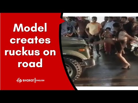 Drunken model creates commotion on road in Gwalior, stops army vehicle and kicks jawan Drunken model creates commotion on road in Gwalior, stops army vehicle and kicks jawan
