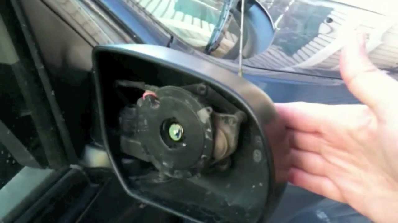 How to replace side mirror on 2007 ford fusion #6