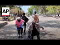 People run away from gunfire in another Haiti gang attack