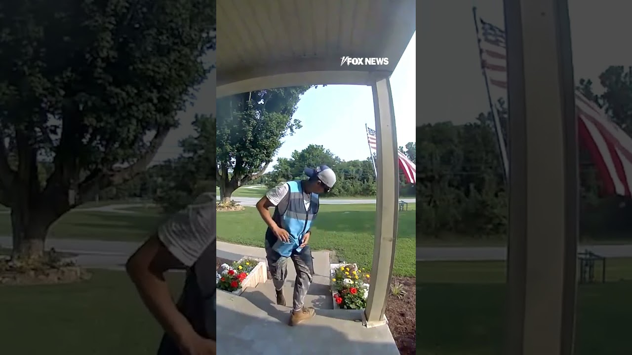 Amazon driver stops delivery to salute American flag