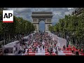 The Champs-Élysées is transformed into a massive table for a special picnic