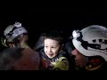 Syrian boy smiles after being pulled from quake rubble