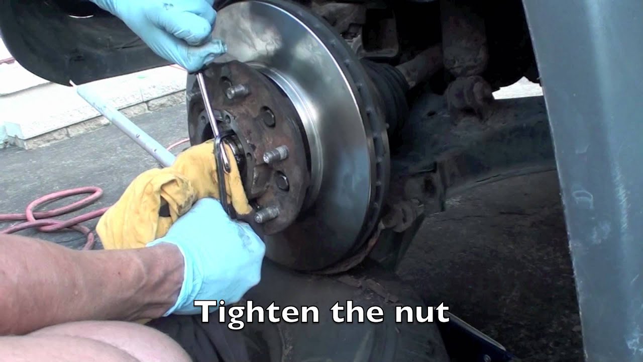 How to change rotors on nissan frontier 4x4 #4