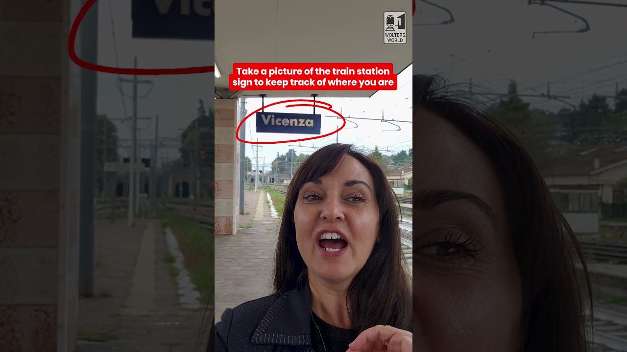 Take a picture of the train station sign to keep track of where you are
