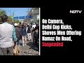 On Camera, Delhi Cop Kicks, Shoves Men Offering Namaz On Road, Suspended  - 01:19 min - News - Video