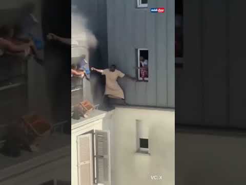 Brave Paris man Fousseni Sissoko risks life to save neighbours kids from deadly fire  36 thousand views  play Short