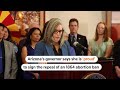 Arizona governor signs 1864 abortion ban repeal | Reuters