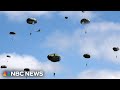 Parachutists leap from WWII-era planes over Normandy to help mark D-Days 80th anniversary