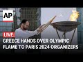 LIVE:  Greece hands over Olympic flame to Paris 2024 organizers