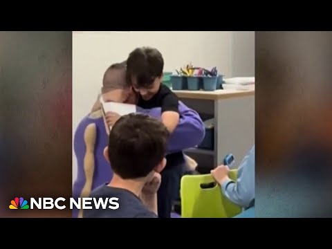 Photo for: Military father surprises son dressed as school mascot