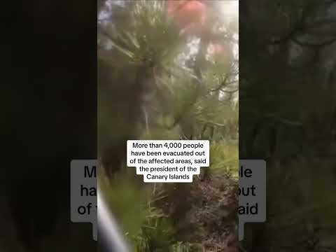 Firefighters drenched as plane drops retardant