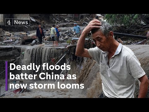 China floods: At least 11 people dead and dozens missing in Beijing