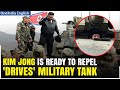 North Korea's Kim Jong Un Reportedly Drives New Military Tank in Mock Battle
