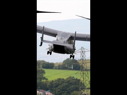 Military aircraft makes hard landing after catching fire