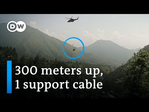 Breaking: Risky airborne rescue to reach 8 people trapped in cable car