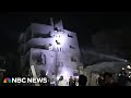 Video said to show aftermath of an Israeli attack on a home in central Gaza