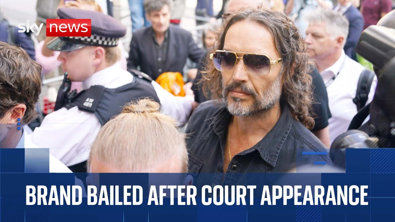 Russell Brand arrives at court to face rape and sexual assault charges