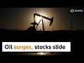 Stocks slide on Ukraine woes, oil surges above $100
