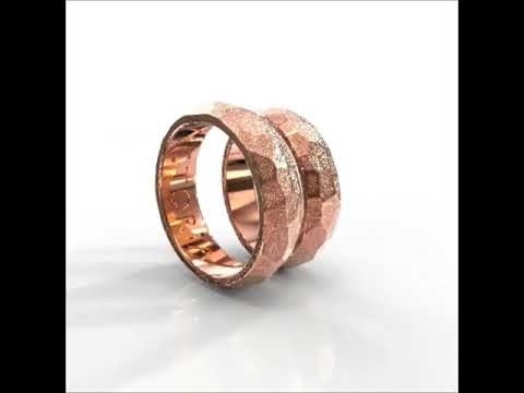Парные обручальные кольца из красного золота с фактурной поверхностью