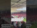 Parachutist rescued after dangling from rugby stadium roof in France | REUTERS
