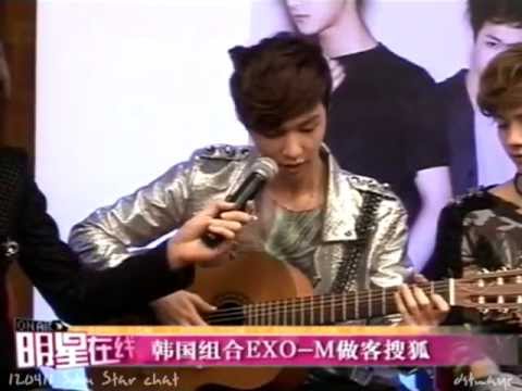 120411 EXO-M Lay playing the guitar while singing