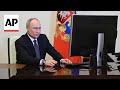 Putin accuses Ukraine of trying to disrupt Russias election