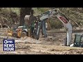 Texas teams peel away layers of flood debris in search for missing