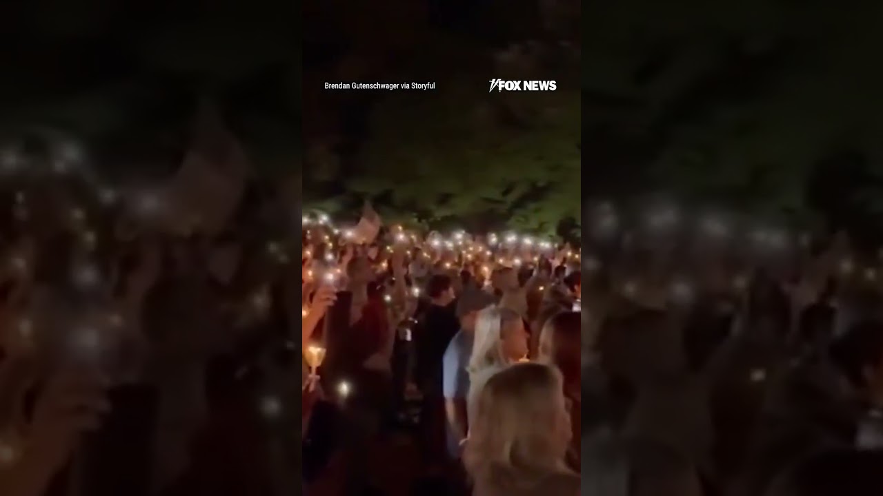 REMEMBERING HIS LEGACY: Mourners sing "Amazing Grace" during a tribute to Charlie Kirk #shorts #usa