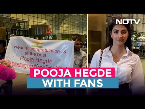 Cannes 2022: Fans surprise Pooja Hegde with a poster at the airport Cannes 2022: Fans surprise Pooja Hegde with a poster at the airport