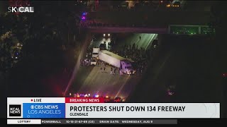 Protestors use cars, big rig to block 134 Freeway in Glendale