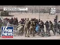 Mainstream media ignores shocking video of migrants storming border
