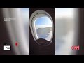 Boeing 737-800 engine cover falls off during Southwest flight(CNN) - 03:29 min - News - Video