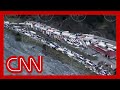 Drone video shows massive traffic jam as Russians flee the country