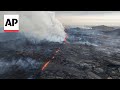 WATCH: Drone footage shows Iceland volcano spewing red lava