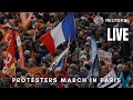 LIVE: Protesters march in Paris on the 10th day of nationwide strikes