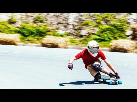 POV Downhill Longboarding with a Twist: No Hands Allowed | Red Bull No Paws Down